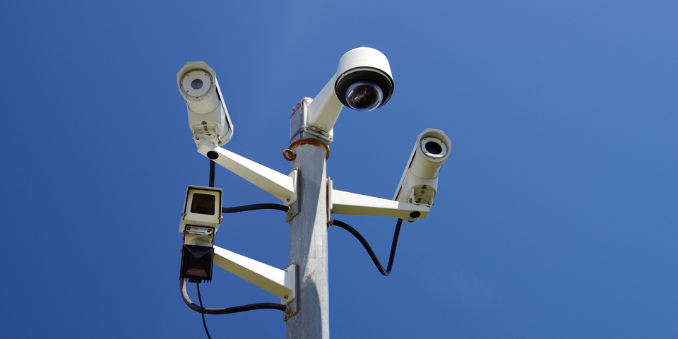 Risk mitigation with surveillance devices: insurance impacts